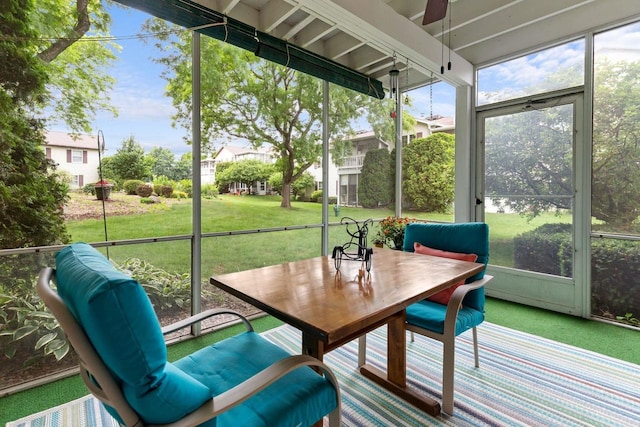 2360 Wisconsin St, Oshkosh, WI 54901 - sunroom / solarium featuring ceiling fan and outdoor dining space