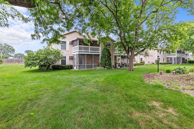 2360 Wisconsin St, Oshkosh, WI 54901 - view of green lawn featuring a sunroom