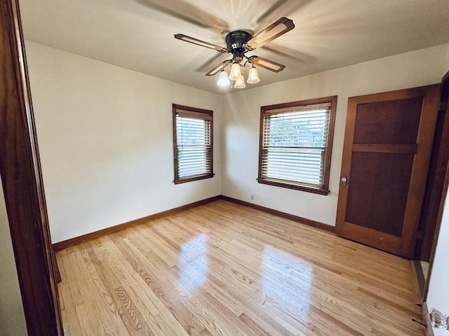 2377 S 76th St, West Allis, WI 53219 - empty room featuring light wood-style flooring and a ceiling fan