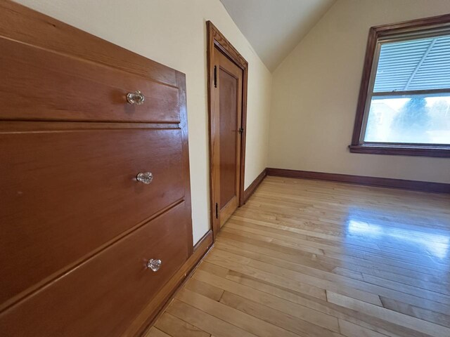 2377 S 76th St, West Allis, WI 53219 - hallway with vaulted ceiling and light wood-type flooring