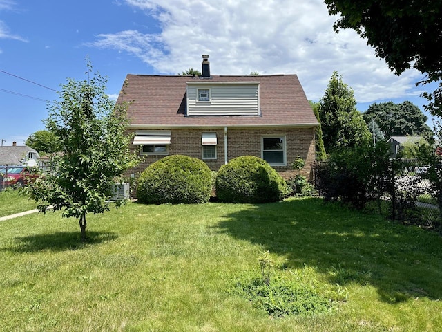 2377 S 76th St, West Allis, WI 53219 - view of front of property featuring brick siding and a chimney