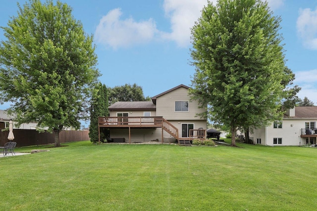 5538 Galway Dr, Waunakee, WI 53597 - rear view of property with a wooden deck and stairs