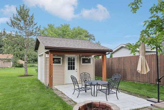 5538 Galway Dr, Waunakee, WI 53597 - view of outbuilding with a fire pit