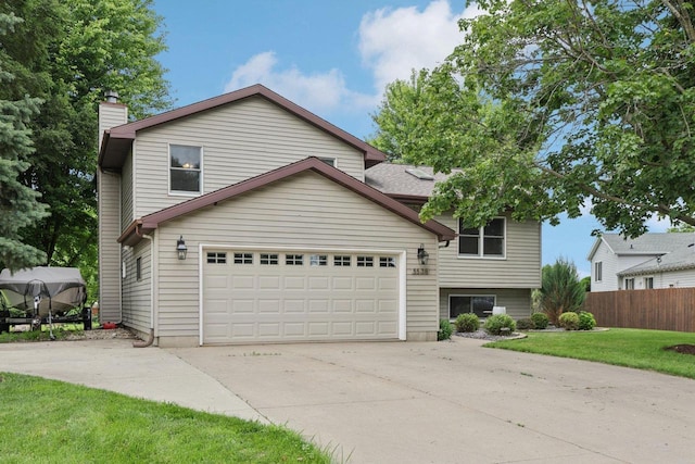 5538 Galway Dr, Waunakee, WI 53597 - view of front of property with concrete driveway and a chimney