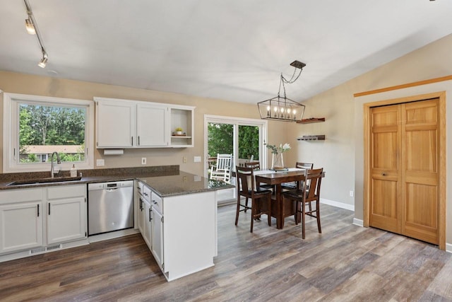 5538 Galway Dr, Waunakee, WI 53597 - kitchen with dishwasher, open shelves, dark wood-type flooring, white cabinetry, and a peninsula