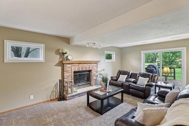 5538 Galway Dr, Waunakee, WI 53597 - living area with carpet floors and a fireplace