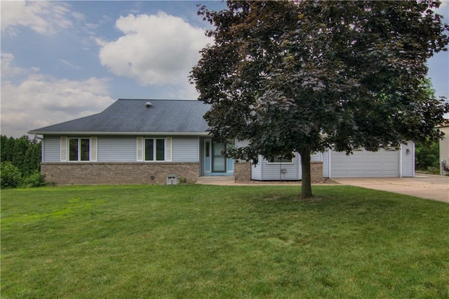 1634 Nicholas Dr, Eau Claire, WI 54703 - view of front of property with driveway, brick siding, a front lawn, and a garage