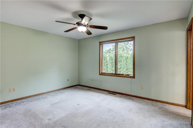1634 Nicholas Dr, Eau Claire, WI 54703 - empty room with carpet and a ceiling fan