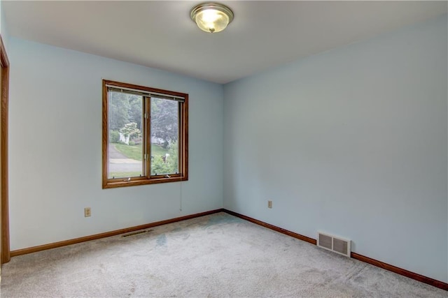 1634 Nicholas Dr, Eau Claire, WI 54703 - spare room with carpet flooring and baseboards