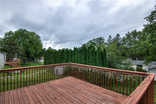 1634 Nicholas Dr, Eau Claire, WI 54703 - wooden terrace with a lawn