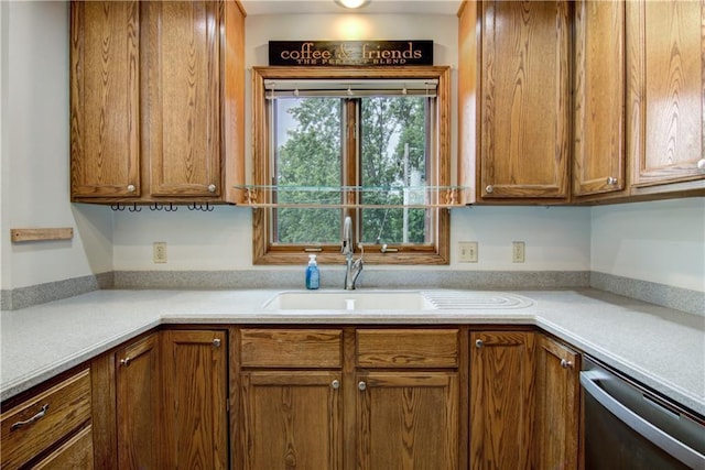 1634 Nicholas Dr, Eau Claire, WI 54703 - kitchen with dishwasher, brown cabinets, and light countertops