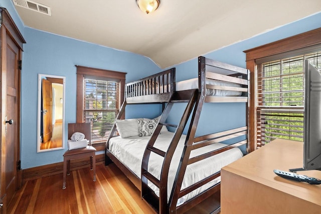 415 S Lake Shore Dr, Lake Geneva, WI 53147 - bedroom with wood-type flooring and lofted ceiling