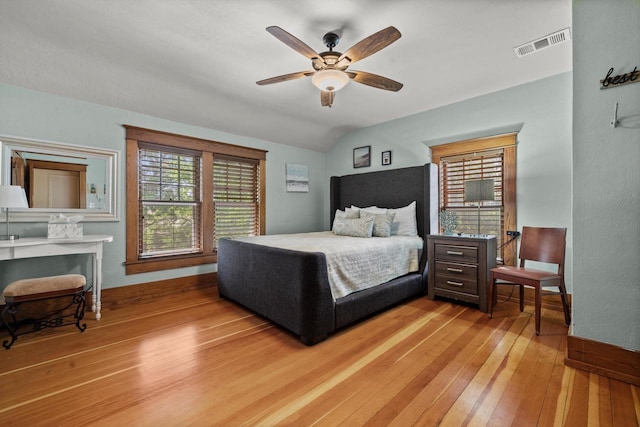 415 S Lake Shore Dr, Lake Geneva, WI 53147 - bedroom with light wood-type flooring, lofted ceiling, and ceiling fan