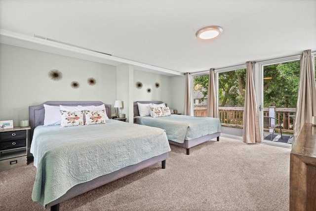 415 S Lake Shore Dr, Lake Geneva, WI 53147 - bedroom with access to outside, multiple windows, and carpet