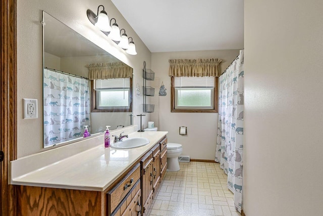 3948 S 72nd St, Milwaukee, WI 53220 - bathroom featuring vanity, plenty of natural light, and a shower with shower curtain