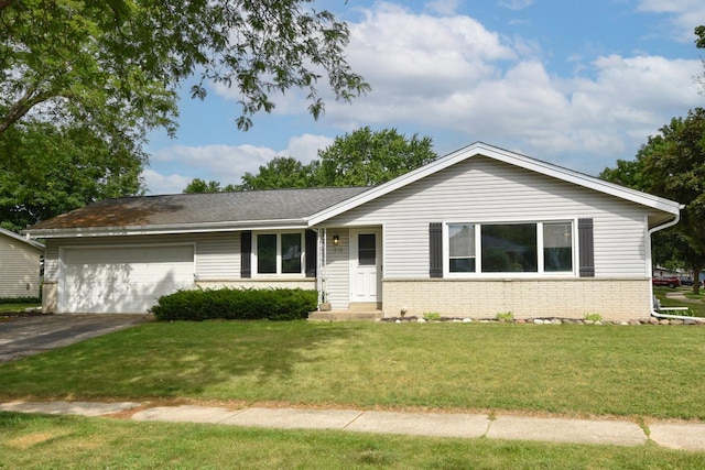 1232 Lambeth Rd, Waukesha, WI 53189 - ranch-style home with brick siding, a garage, asphalt driveway, and a front yard