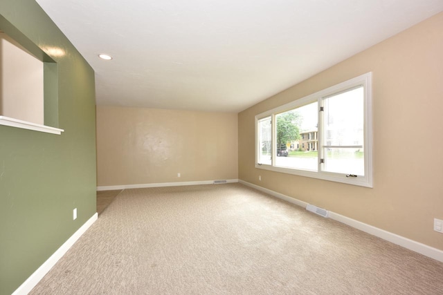 1232 Lambeth Rd, Waukesha, WI 53189 - carpeted spare room featuring baseboards and recessed lighting