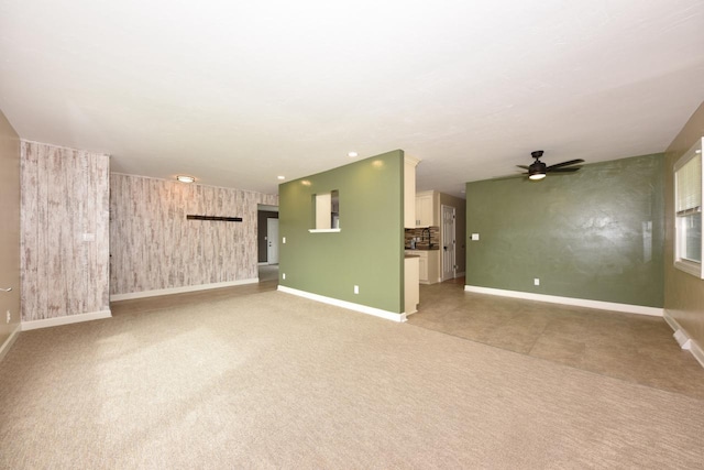 1232 Lambeth Rd, Waukesha, WI 53189 - unfurnished living room with a ceiling fan and light colored carpet