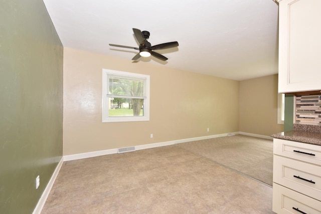 1232 Lambeth Rd, Waukesha, WI 53189 - unfurnished living room with light carpet and ceiling fan