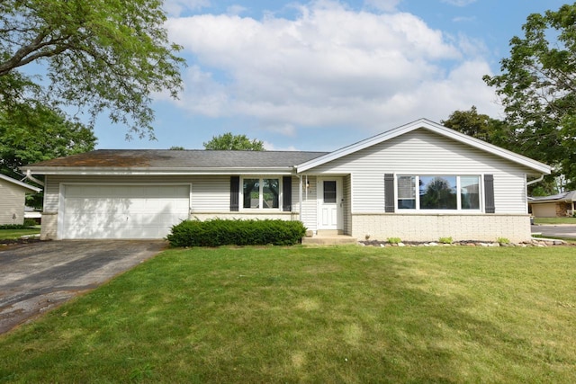 1232 Lambeth Rd, Waukesha, WI 53189 - ranch-style house with a garage, asphalt driveway, brick siding, and a front yard