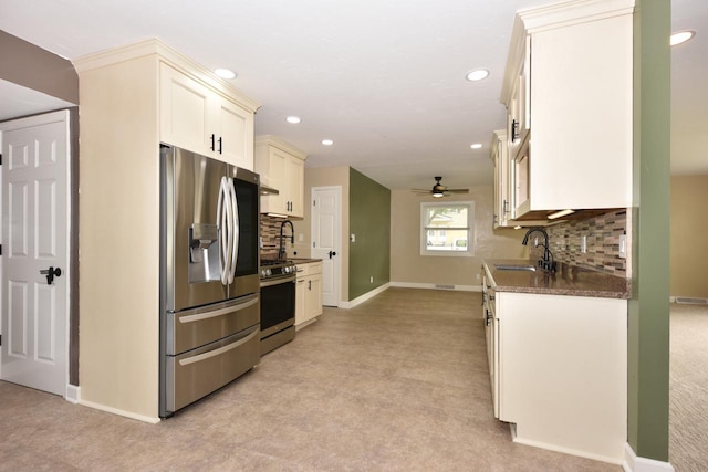 1232 Lambeth Rd, Waukesha, WI 53189 - kitchen featuring appliances with stainless steel finishes, light colored carpet, recessed lighting, tasteful backsplash, and a ceiling fan