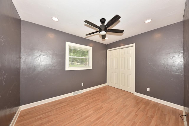 1232 Lambeth Rd, Waukesha, WI 53189 - unfurnished bedroom featuring wood finished floors, recessed lighting, a closet, and a ceiling fan