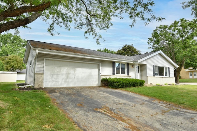 1232 Lambeth Rd, Waukesha, WI 53189 - ranch-style house with driveway, a garage, a front yard, and brick siding