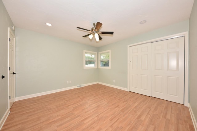 1232 Lambeth Rd, Waukesha, WI 53189 - unfurnished bedroom featuring light wood-style flooring, recessed lighting, a closet, and ceiling fan
