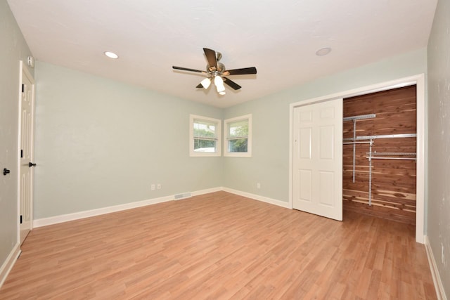 1232 Lambeth Rd, Waukesha, WI 53189 - unfurnished bedroom with light wood-type flooring, a closet, recessed lighting, and ceiling fan