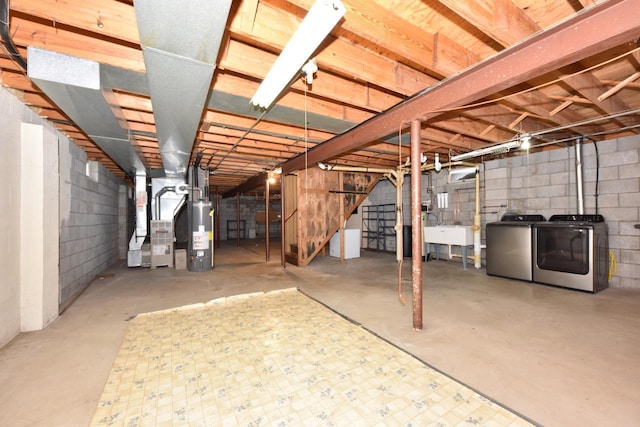 1232 Lambeth Rd, Waukesha, WI 53189 - unfinished basement featuring separate washer and dryer, stairs, gas water heater, heating unit, and concrete block wall