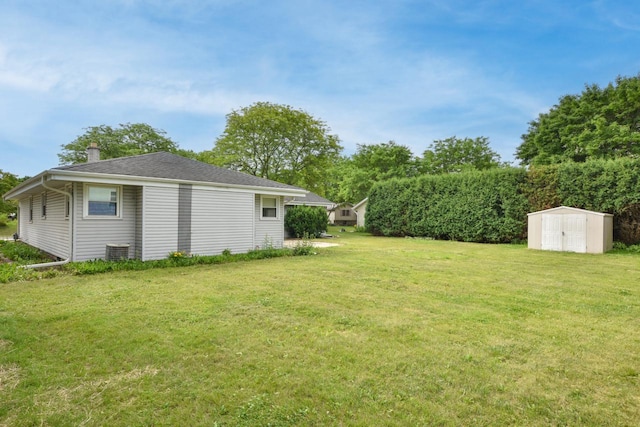 1232 Lambeth Rd, Waukesha, WI 53189 - view of grassy yard with a storage unit