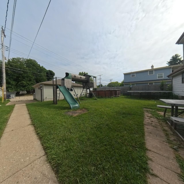 8761 W Herbert Ave, Milwaukee, WI 53225 - view of yard featuring a playground