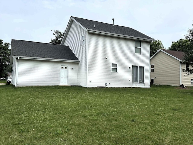 2354 Daylily Ct, Beloit, WI 53511 - rear view of property with a yard