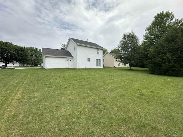 2354 Daylily Ct, Beloit, WI 53511 - view of grassy yard featuring a garage