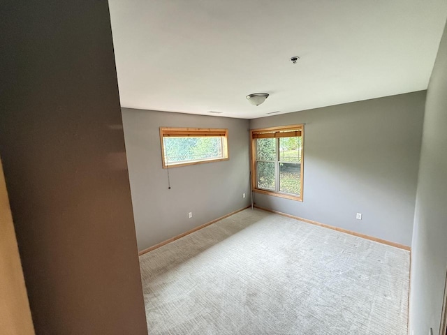 N82W13370 Fond Du Lac Ave Unit 101, Menomonee Falls, WI 53051 - empty room with baseboards and carpet floors