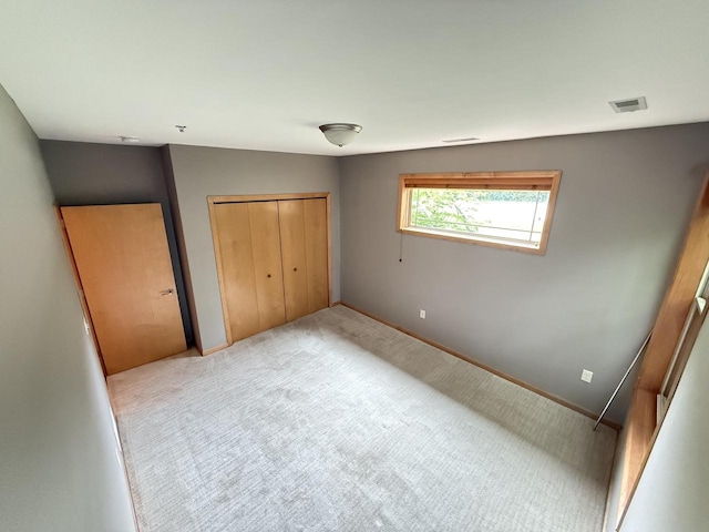 N82W13370 Fond Du Lac Ave Unit 101, Menomonee Falls, WI 53051 - unfurnished bedroom with carpet floors and a closet