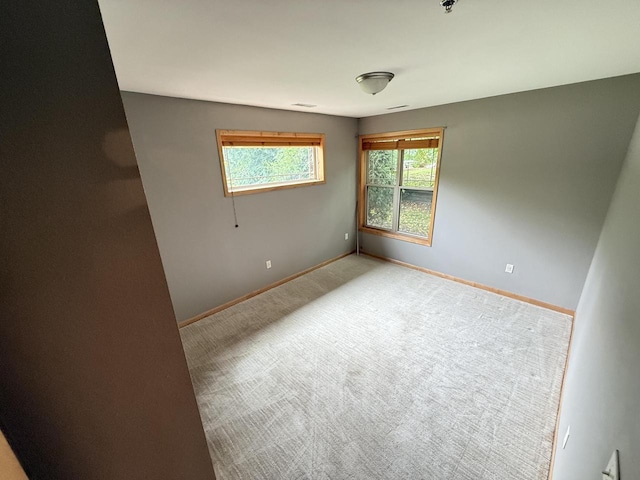 N82W13370 Fond Du Lac Ave Unit 101, Menomonee Falls, WI 53051 - carpeted spare room with baseboards and a pendent fire sprinkler