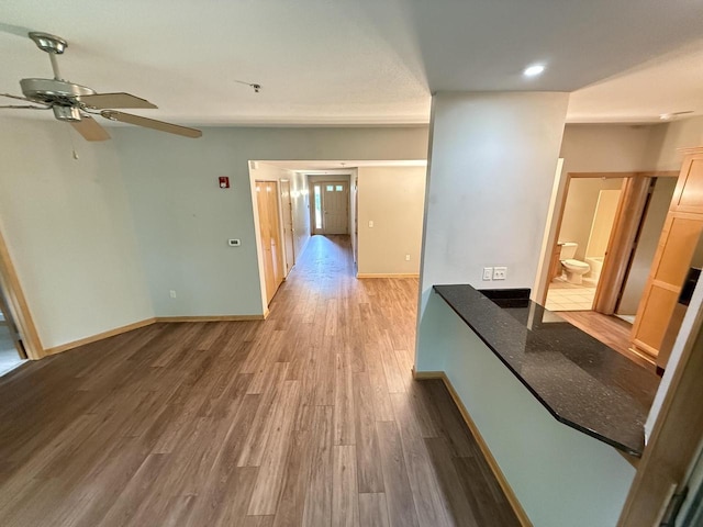 N82W13370 Fond Du Lac Ave Unit 101, Menomonee Falls, WI 53051 - corridor featuring wood finished floors and recessed lighting