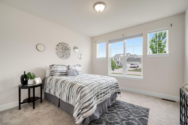 520 Meadow View Dr, Slinger, WI 53086 - carpeted bedroom featuring baseboards