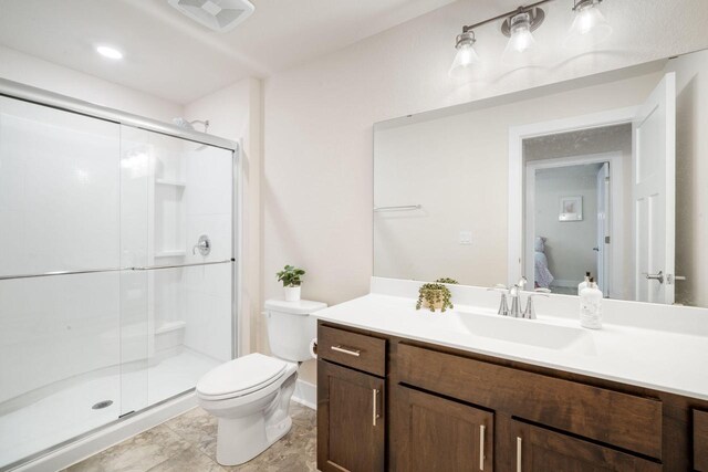 520 Meadow View Dr, Slinger, WI 53086 - bathroom with vanity, a shower stall, and ensuite bath