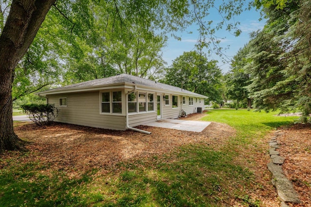 15300 Clifford Ct, Brookfield, WI 53005 - view of property exterior featuring a patio and a yard