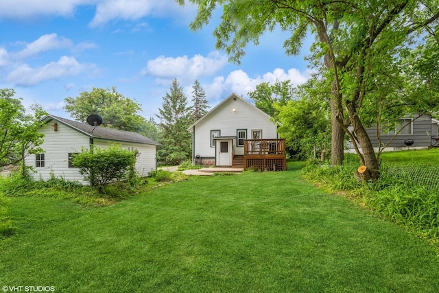 W3632 Oakrest Ave, Lake Geneva, WI 53147 - back of property with a deck and a lawn