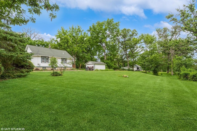 W3632 Oakrest Ave, Lake Geneva, WI 53147 - view of green lawn with an outbuilding