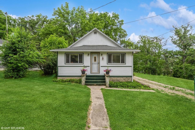 W3632 Oakrest Ave, Lake Geneva, WI 53147 - bungalow-style home with a front lawn and roof with shingles