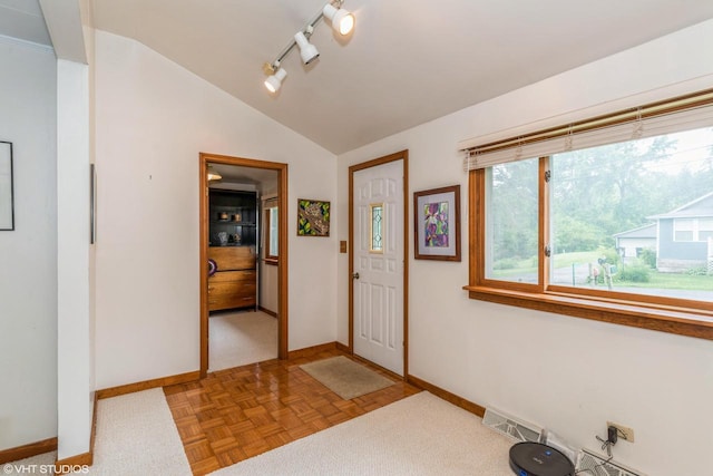 W3632 Oakrest Ave, Lake Geneva, WI 53147 - entrance foyer featuring lofted ceiling and track lighting