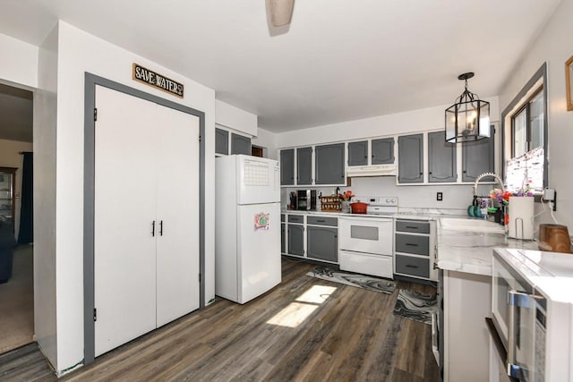 5640 Cambridge Ln Unit 5, Mount Pleasant, WI 53406 - kitchen with white appliances, gray cabinets, dark wood-type flooring, and under cabinet range hood