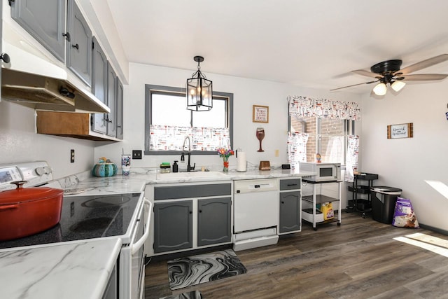 5640 Cambridge Ln Unit 5, Mount Pleasant, WI 53406 - kitchen with white appliances, dark wood-style floors, gray cabinets, and light stone countertops