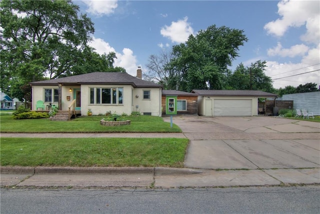 1418 Keith St, Eau Claire, WI 54701 - view of front of property featuring a garage, a chimney, driveway, and a front lawn