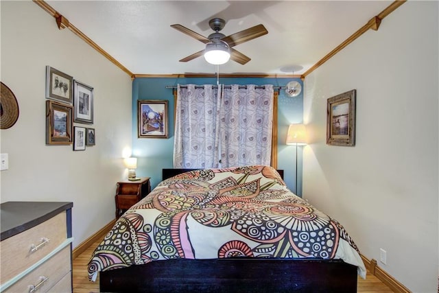1418 Keith St, Eau Claire, WI 54701 - bedroom featuring crown molding, light wood-style flooring, and a ceiling fan