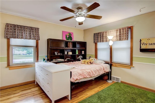 1418 Keith St, Eau Claire, WI 54701 - bedroom featuring light wood-type flooring and a ceiling fan